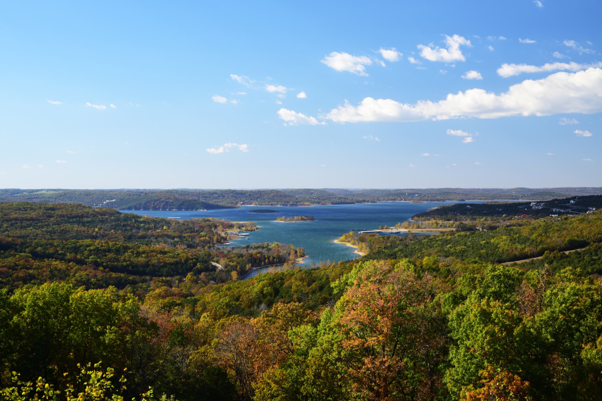 Autumn Ozark hills framing blue lake coves in the Missouri Ozarks